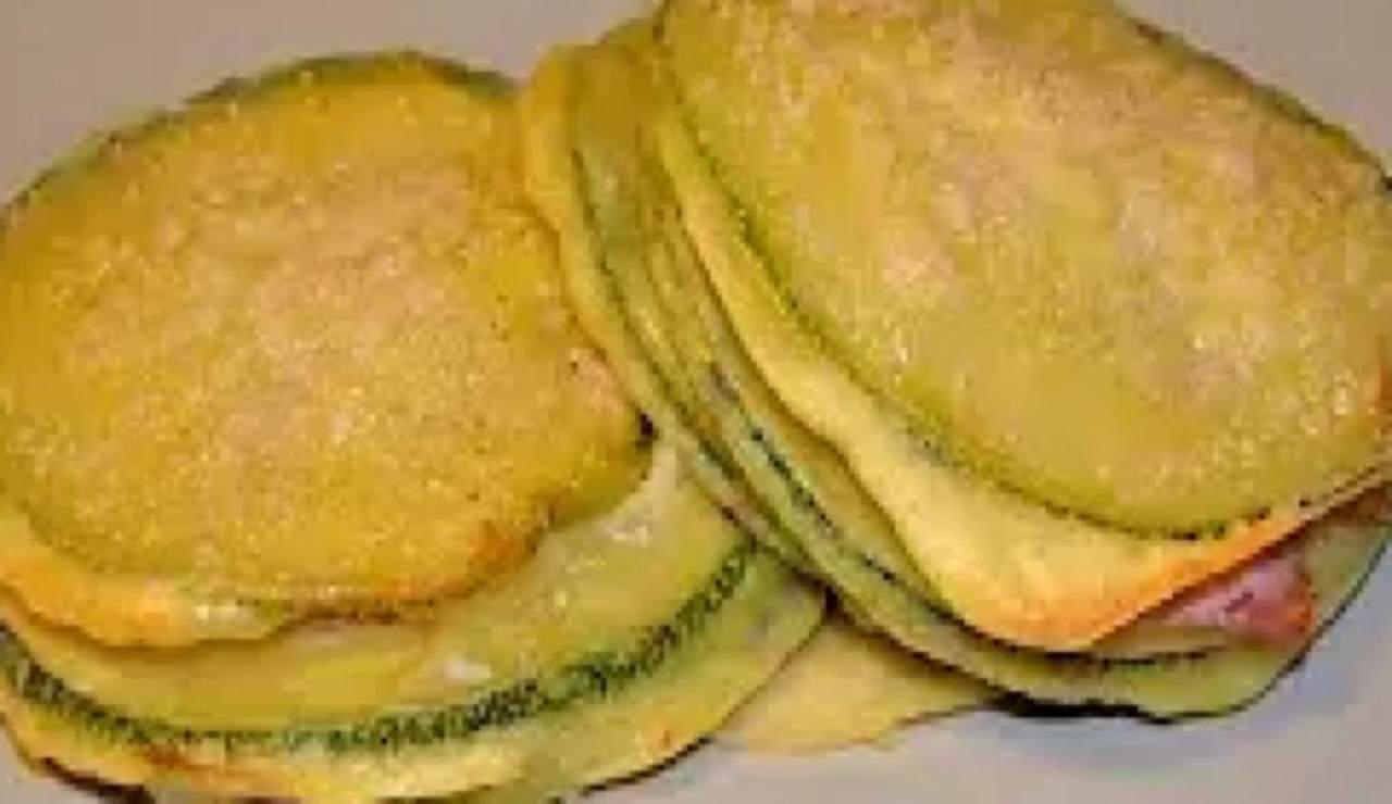 Zucchine farcite con cotto e formaggio. Ricetta