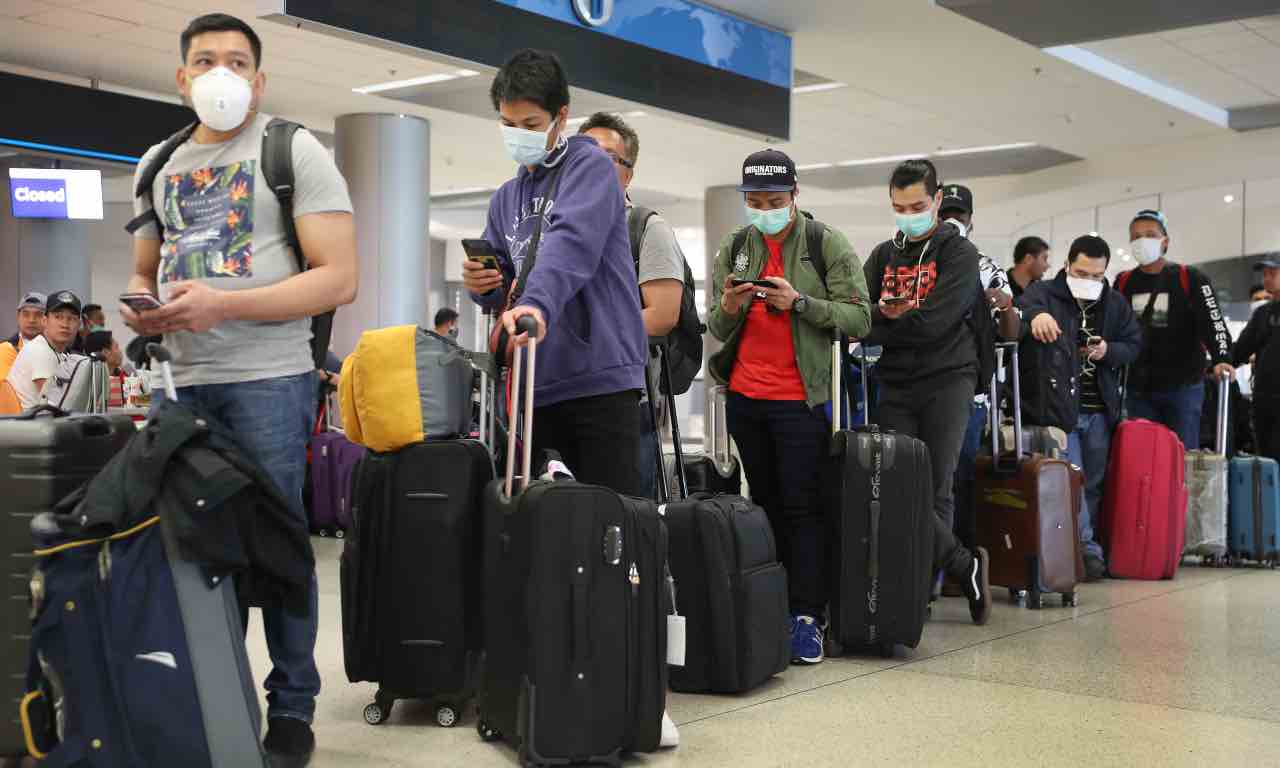 covid fila passeggeri