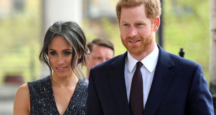 Harry e Meghan Markle sorriso