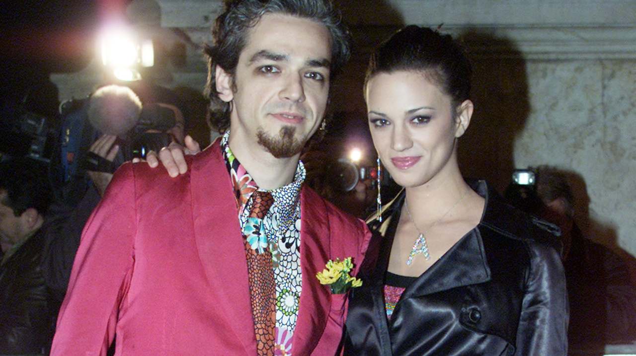 Asia Argento e Morgan sorridono