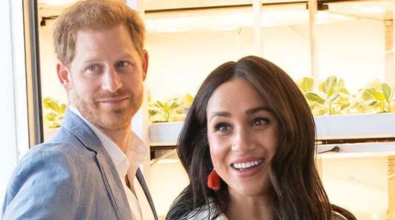 Harry e Meghan sorridenti