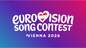Logo ufficiale dell'Eurovision Song Contest Vienna 2026 su sfondo sfumato viola e rosa con il cuore della bandiera austriaca.